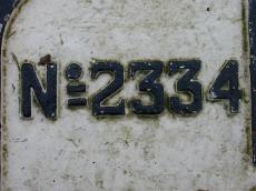 no number 2334 stone rock embossed painted metal script