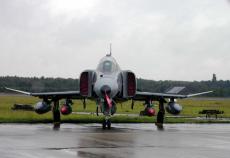 wet F-4 phantom attack aircraft jet fighter runway front