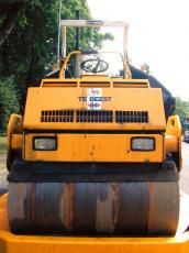 vehicles land roller roadroller metal rust wet headlights