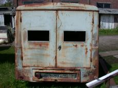 vehicles land car van door doors metal texture rusted window windows gray oldtimer