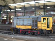 train maintanance yellow speeding fast station locomotive