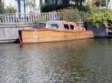 wood wooden speedboat boat canal fast speed peer gynt windows portholes