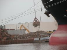 bow of ship scrapheap scrap metal scrapyard crane