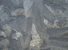 ice crystal craggy grey gravelly lines splinters