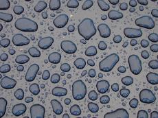 water drops on surface car hood black