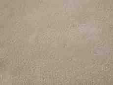 ground flat smooth foam sand beach brown little holes bubbles