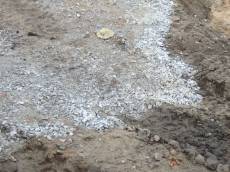 tabus stone stones ground gravel gray rubble tracks tiretracks