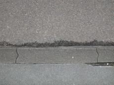 ground cement pavement sidewalk curb bricks concrete grey