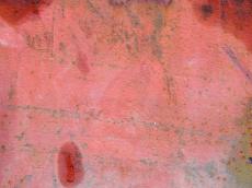 rust flat surface red pink craggy wall