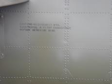 metals plating rivetted rivets rivet typo typography spraypainted caution green millitary airforce