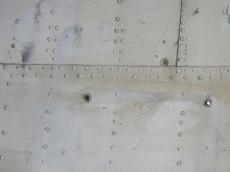 metal plate plates rivet rivets bolts wing aeroplaine airplane white