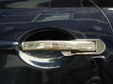 car door handle reflection chrome shiny shining reflecting