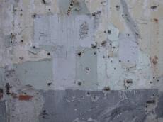 old wall holes plaster grey
