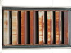 metal grating brown rust rusting rusted spoke spokes metallic