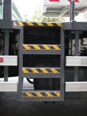 steps yellow black stripes vehicle metal black