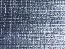 foil tin tinfoil wrapping silver silvery glossy shining shiny reflecting grey blueish blue plastic insulation insulating