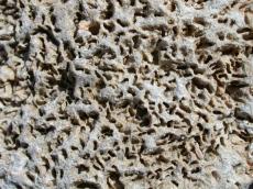 porous stone rock holes brown