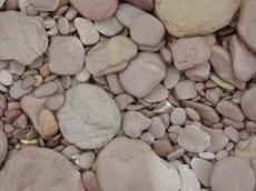 rock rocks pebble pebbles flat surface ground floor grey different sizes of