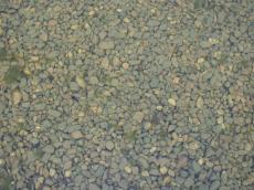pebbles under water rocks