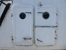 white metal painted door portholes latch hinges windows