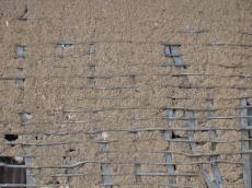 mud wall beams wood poles brown