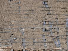 thatched roof roofing mud crack cracks timber twig twigs