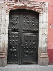 heavy iron door black wall double doors