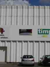 rigoletto metal wall advertisements signs cars parked