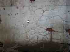 old cracked wall plaster brick