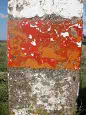 pole stone post chipped paint concrete sign