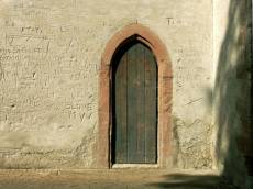 betina walls texture graffitty carvings carved names text scripts door wooden arch church