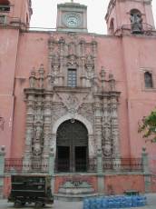 dario church front water bottles clock doors ornate