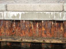 tabus dock quay rust metal rusted water edge brown
