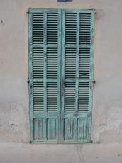 wall wooden wood window pane panes shutter shutters green  peeled off