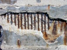 concrete wall rusted crumbled cracked weathered texture