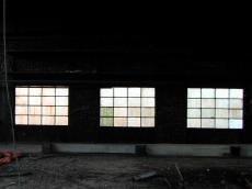 dirty factory windows sillouette debris wall
