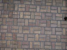 bricks brick ground floor square rechtangle rectangular cement brown pavement