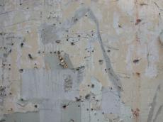 sandstone wall dirty old holes rust pipes