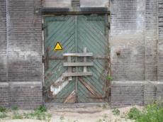 door closed factory building condemned wooden locked forbidden boarded up