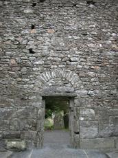 wall thick heavy port portcullis gate doorway stones roman path small