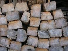 wood pile piled sawn poles log logs