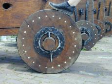 wheel of a old cannon wood